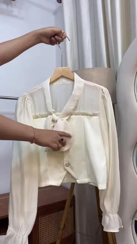 chic-elegance-in-every-thread-cream-bow-tie-blouse